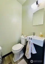 Half bath located off bonus room.