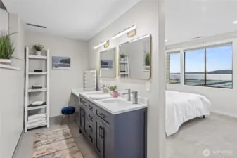 Primary bathroom sinks with makeup counter.