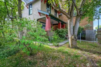 Side view of the Front Porch with Cherry Blossoms scattered around!