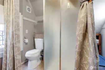 Another view of the shower in the "Attic" the curtains can be pulled around for privacy.