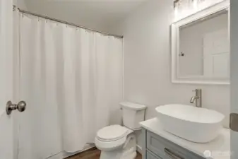 Refreshed bath with new vanity and flooring