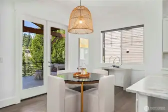 Breakfast nook next to living and kitchen