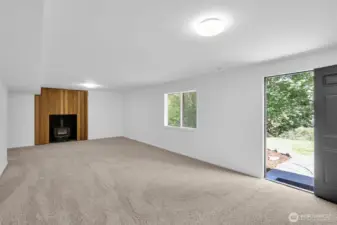 Huge Lower level Great room with separate entrance and wood stove.  All new paint and carpeting!