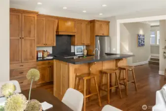 Entertaining is easy whether casually dining at the kitchen counter or around the table in the generous dining area.