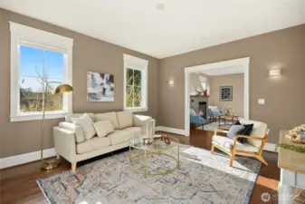 The great room/living room opens to the den/media room.