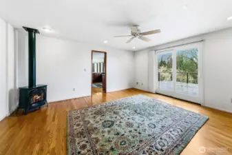 Just off the kitchen and entry is a wonderful TV room, or playroom for children