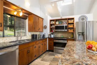 Chef’s Delight!  Loads of upgrades include stainless Kenmore Elite stainless appliances, including a French-door refrigerator with pull-out drawers and versatile five-burner range along with an undermount stainless steel sink with gooseneck faucet.