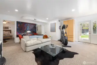 Explore the options in the expansive lower level with separate entrance—ideal for guests or multi-use living.