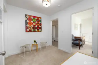 The lower level extra room serves as a dressing room or storage area with generous closet space. Pass through to the 3rd bath, 3rd bedroom and laundry.