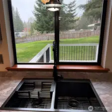 Elegant new kitchen double sink, great views to the backyard