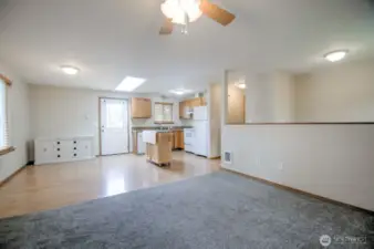 Living room looking towards kitchen and eating area.