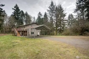 Side view with detached carport