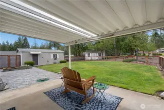 Covered patio, enjoy the view and the fully fenched dog friendly back yard.