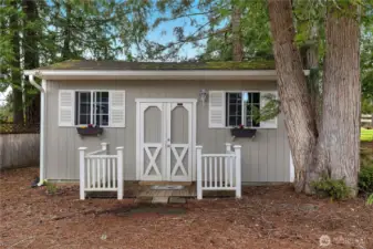 Shed that opens up with electricity inside.  Lots of options for this she shed!