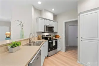 Abundant counterspace & cabinets, pantry space, and all brand new appliances.