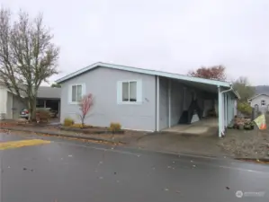 Carport w/2 Storage-Shop Spaces & Entry via Utility Room