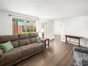 Living Room with view of Dining Room and Back Door to Porch