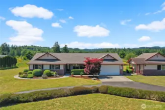 Home has circular drive and unattached studio with 1/2 bath!
