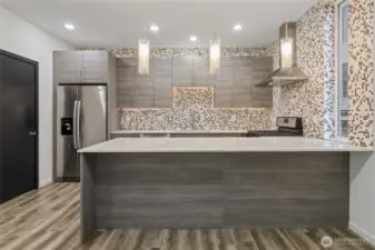 Large kitchen island with bar for seating