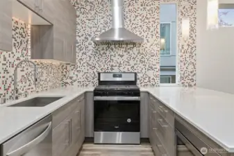 Gas cooking, soft close drawers, stainless appliances.