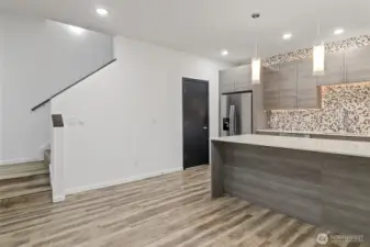 Living room and kitchen, large walk in closet off kitchen for pantry and storage