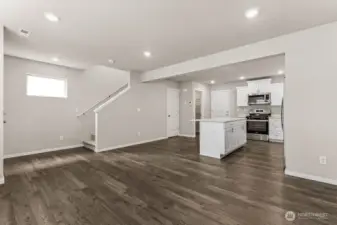 Photo is for representation purposes only. No carpet downstairs and kitchen island LOVE!