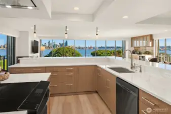 Huge chef's kitchen with wraparound counters for easy entertaining and amazing views
