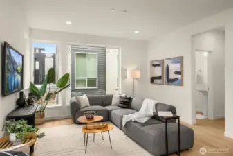 Bright dining area situated perfectly between the kitchen and living room for a natural social flow