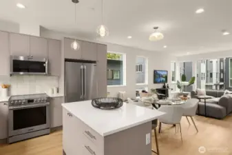 Additional kitchen detail highlighting the built-in microwave and electric range