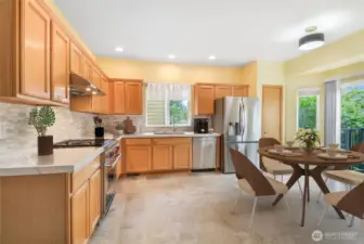 Another view of the kitchen.  Slider out to the deck and the patio.  Convenient for summer bbq's!