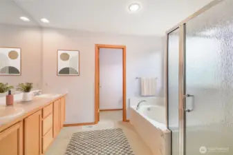 Primary bathroom is lovely with double sinks, and a separate tub and shower.