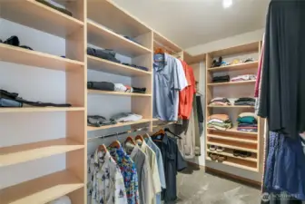 Huge primary closet with fantastic built-in organizers.