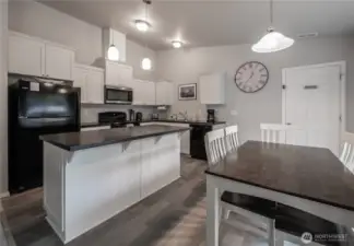 Kitchen showing interior access to suite.