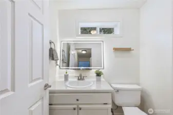 Half bath on main floor with lighted Vanity Mirror
