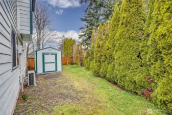 Additional Storage with Tuff Shed on side of house