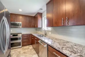 Updated Kitchen in 2014with Granite Countertops and Full Height Tile Backsplash