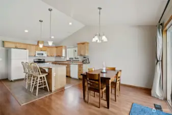 Dining area off kitchen with large island/bar/