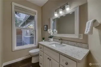 nice powder room to the left of the front door.