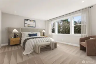 Top floor primary suite provides lots of natural light!