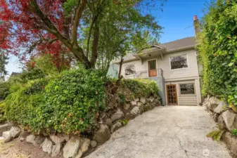 The lower level offers a separate entrance, two large non conforming bedrooms, laundry room and full bathroom with walk in shower.