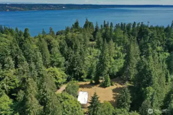 This property is served by a 2 party shared well and 2 bedroom septic system.