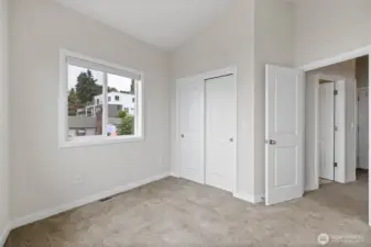The Second bedroom has large windows with views and a good size closet