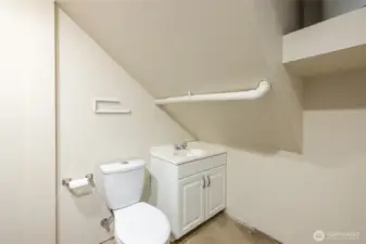 There's a convenient 1/2 bath tucked into the garage!