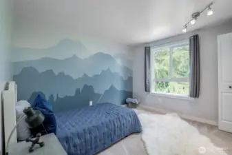 3rd level bedroom with mountain mural
