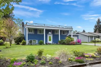 Charming 1960's Colonial split level with beautiful curb appeal.