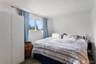 Bedroom 3 (or primary) with double closets on the main.
