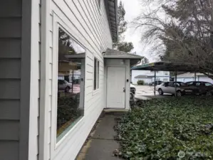 Large ext storage closet with H20 tank & shelves.
