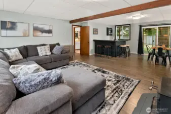 Huge basement area with a built-in bar and seating