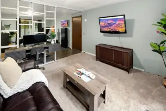 2nd room in the basement used as a flex area with a slider to the backyard