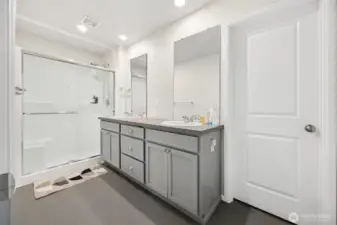 Nice size primary bath with LVP flooring.